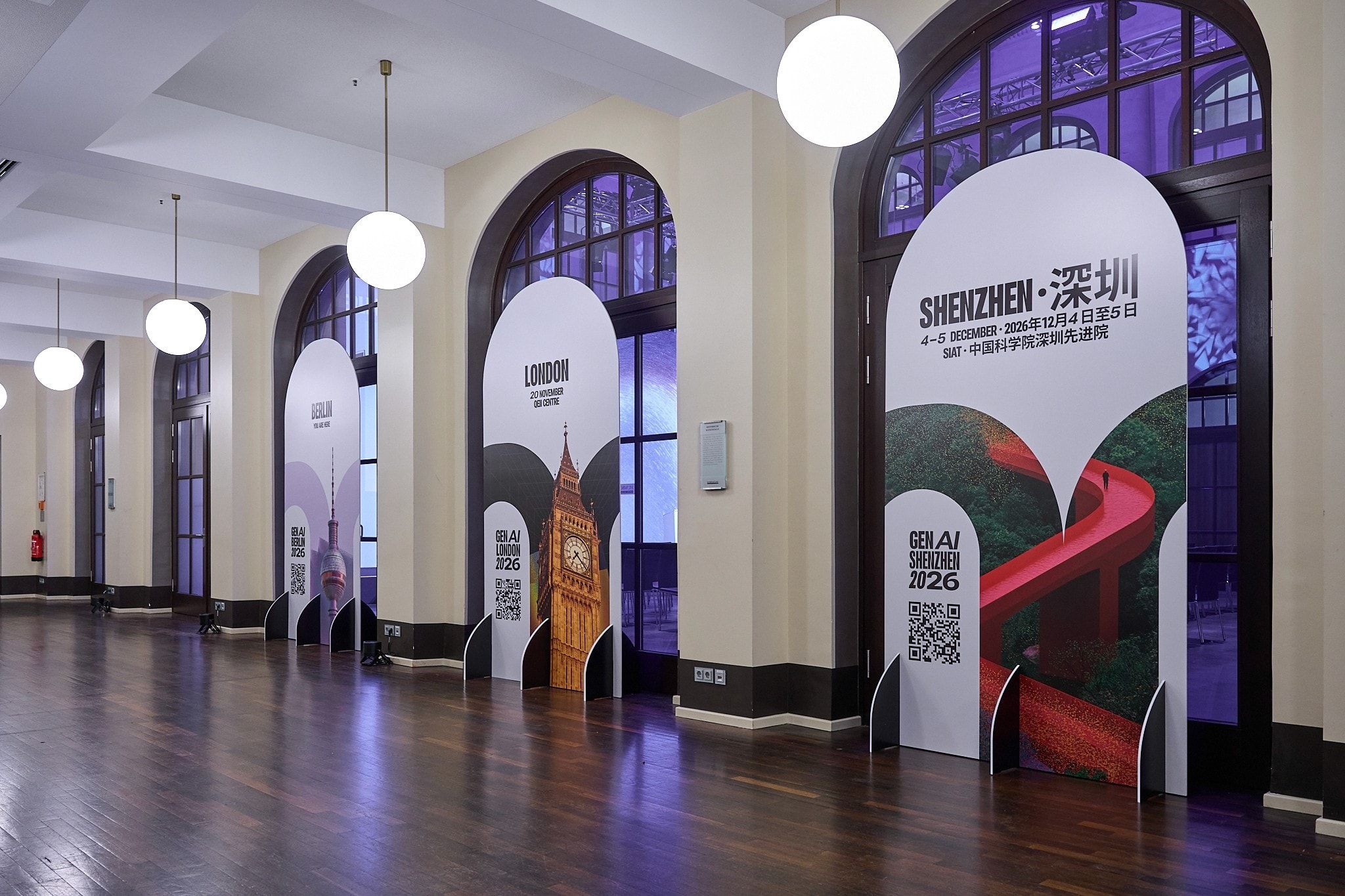 Hallway at Humboldt Carré lined with GenAI Berlin 2026 banners